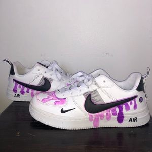 White sneakers with pink and purple drip